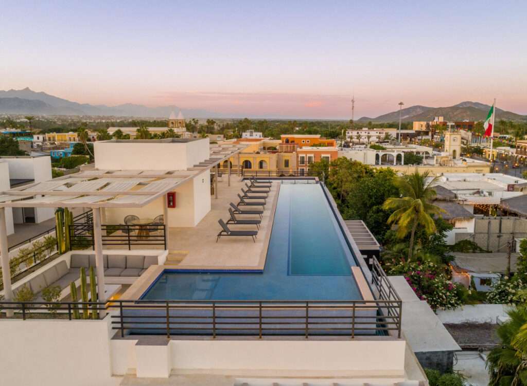 San Jose del Cabo Residencial Coronado Location, Location, Location! Coronado Residence, ideally situated in San José del Cabo. This prime location offers unparalleled access to downtown San José del Cabo and the vibrant Art District, providing an exceptional environment for both living and working.Coronado Residence features a limited collection of 11 condominiums and 2 commercial spaces, ensuring a luxurious experience at a competitive price point. The residences offer 1, 2, and 3-bedroom layouts with corresponding bathrooms, open-concept kitchens equipped with high-quality appliances, and air conditioning for optimal comfort. Residents will also benefit from luxury amenities including a gated lobby with secure access, and a rooftop garden featuring an exclusive social area, jacuzzi, gym, and grill for alfresco enjoyment. Coronado Residence represents an excellent investment for those seeking a unique lifestyle in San José del Cabo. – 121 Miguel Hidalgo, San Jose del Cabo, BS