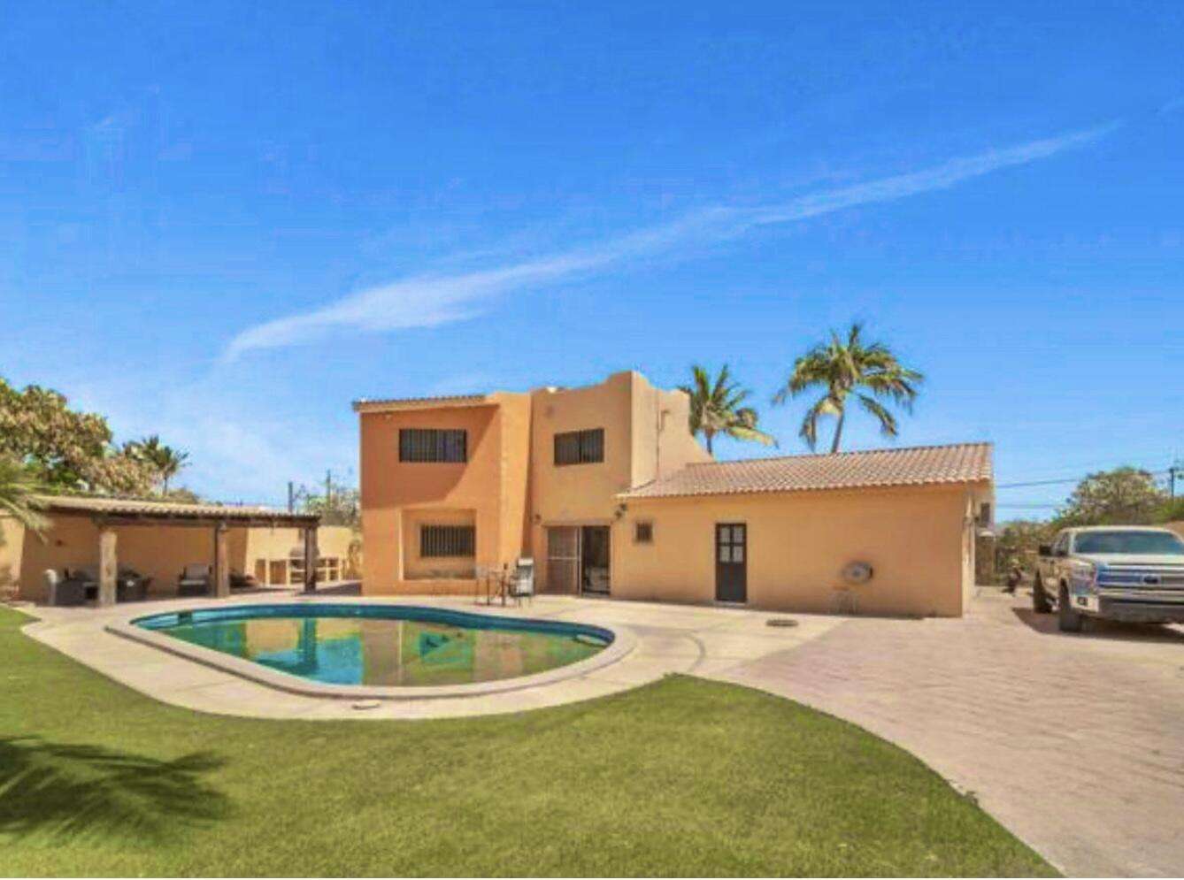 San Jose del Cabo Chamizal Live or invest smart in this versatile 3-bedroom, 3-bath property in San José del Cabo. Featuring two fully independent units: a 1-bedroom studio with full kitchen, private bath, laundry area, and separate entrance; and a spacious 2-bedroom, 2-bath unit with its own kitchen, laundry room, and entrance. Both are fully furnished and equipped with air conditioning. Ideal to live in one and rent the other short or long term. Located in a safe, desirable neighborhood loved by locals and expats. Just minutes from the beach, shops, and restaurants — with a rooftop terrace offering stunning ocean for sale