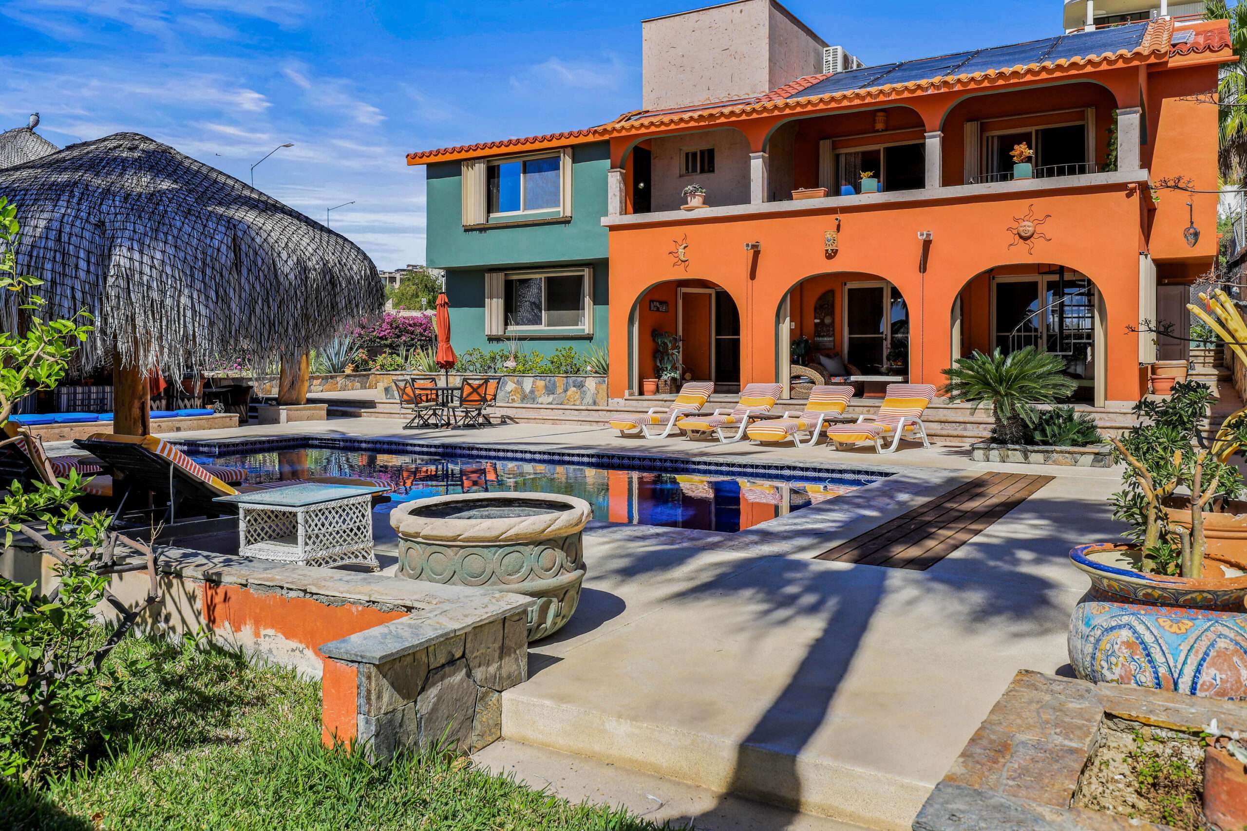 San Jose del Cabo Finisterra STELLAR LOCATION in San Jose´s first residential area, FINISTERRA ST. CASA LULU is an expansive 4BD/4.5BA property on a huge 1000 sq mt/10,807 sq ft. corner lot. ENERGY EFFICIENT with SOLAR PANELS to keep electricity bills extremely low. Completely fenced with a large 2 car Garage & additional space to keep an RV or to store a boat. Spectacular outdoor space with large SOLAR heated SALT WATER swimming pool and PALAPA with BAR & BBQ area. Great opportunity to make this your BAJA home. One Bonus room off the living room is set up for billiards, could also be perfect for an office or media room. Another Bonus space 2rd floor has Laundry Area & Gym. Hurricane Shutters Close to town, the beach, PLC marina & shops. NO HOA dues! OPTION FOR for sale