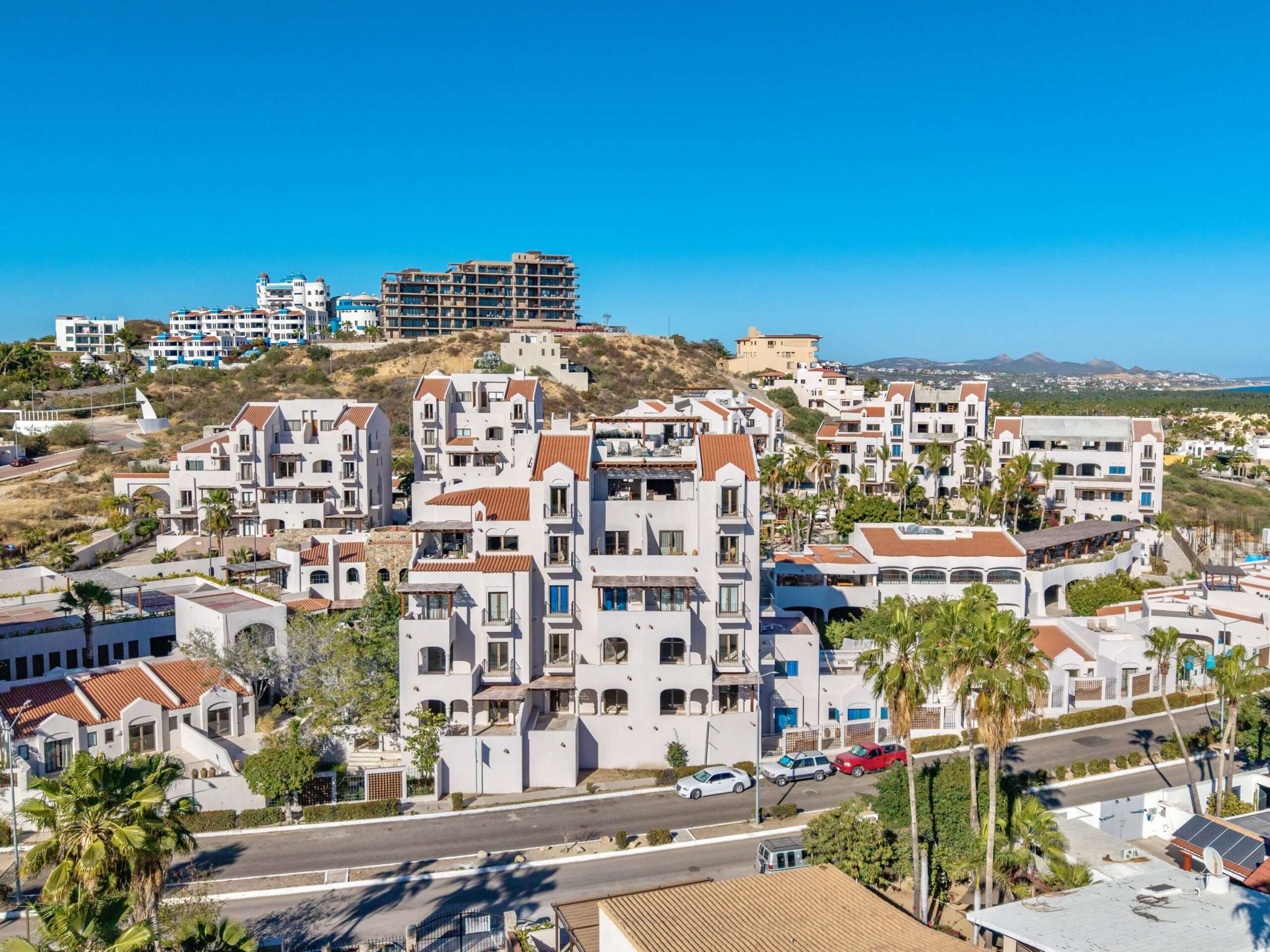 San Jose del Cabo Casa Nima The crown jewel of Casa Nima, this extraordinary penthouse is the only one on its floor, offering absolute privacy with private elevator access and no neighboring units. Designed entirely on one level, it features 4 bedrooms and 4 full bathrooms, where refined living meets effortless flow.The open-concept living area extends onto a generous terrace, framing breathtaking for sale