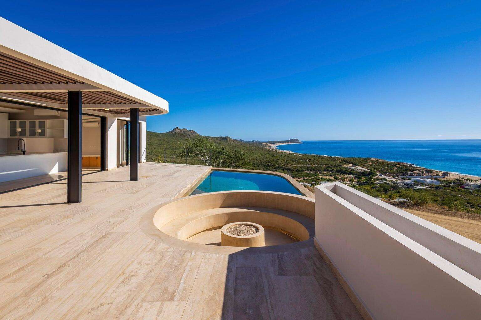 San Jose del Cabo Gringo Hill Tucked into the coveted hillside community of Gringo Hills in Costa Azul, Casa Asha is a contemporary residence by architect Gonzalo Elizarraras. Set on a 519SM lot, the three-bedroom home blends natural Baja materials with modern architecture, open living spaces, and expansive terraces. The upper-level living, dining, and kitchen flow to a generous terrace, while the lower level opens to a lush garden ideal for entertaining under the shade of mature trees. The rooftop offers a versatile space perfect for sunrise yoga, morning coffee, or a barbecue overlooking the Sea of Cortez. A brief 900-meters to the shores of Costa Azul and minutes from San José's historic center, Gringo Hills offers a relaxed lifestyle loved by surfers, artists, and long-time locals. for sale